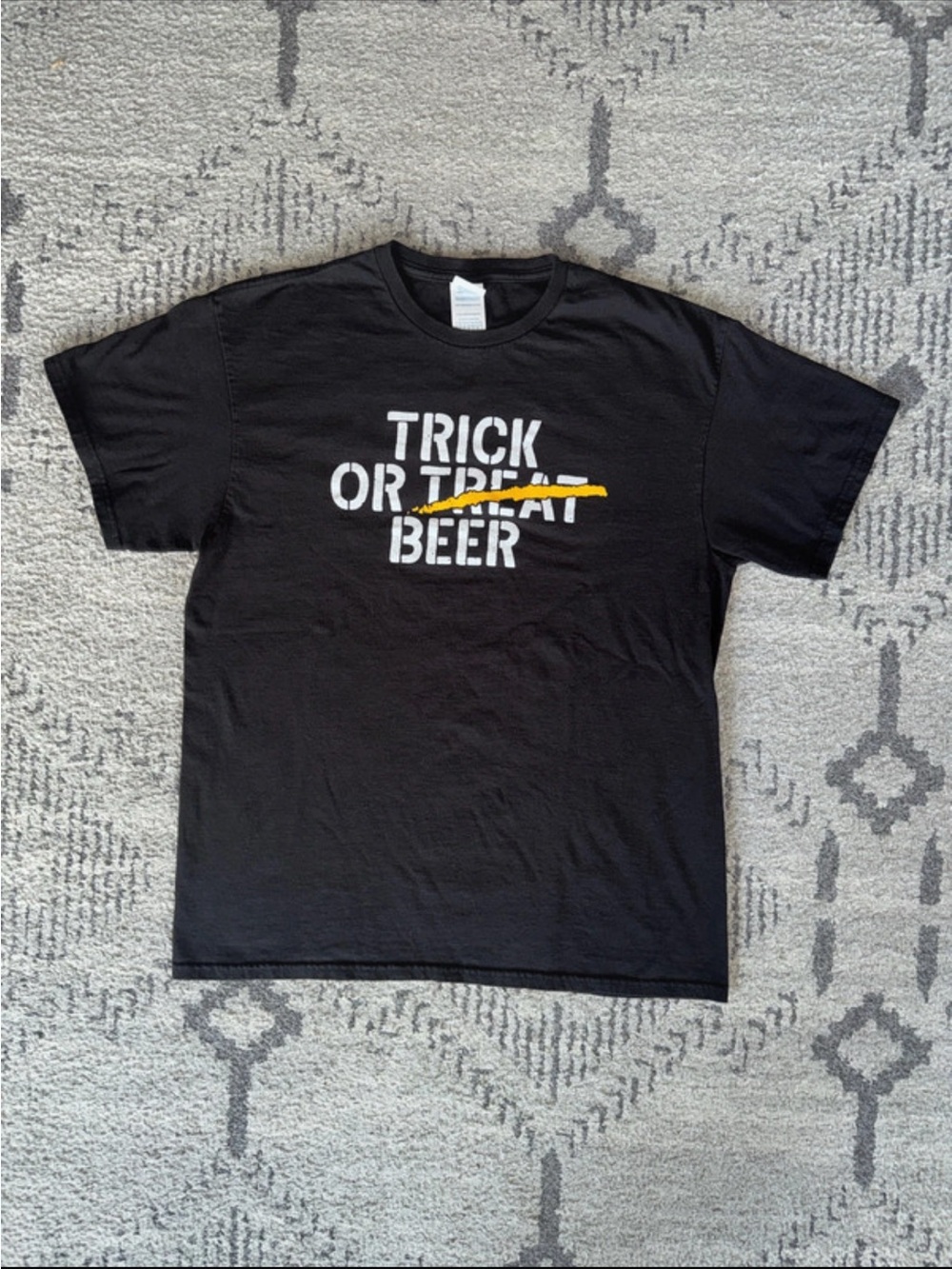 Large Delta Black Tee with White Text and Yellow Strike